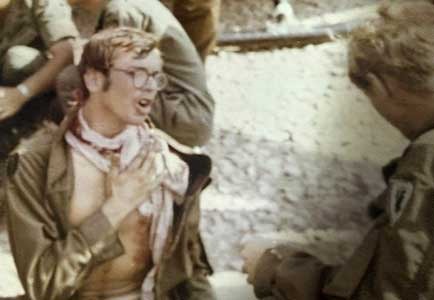 Bob-Kelly-nursing-a-bullet-wound—4.1.71