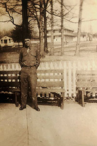 Bushnell,-Earl-20220413-Then8-By-Fence